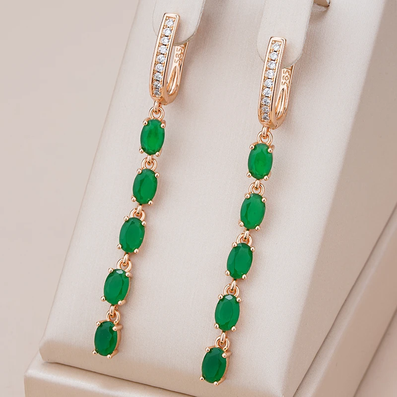 Elegante øredobber med grønne krystaller