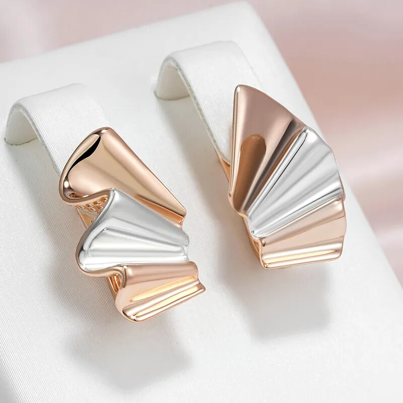 Elegante øreringer i gull og sølv